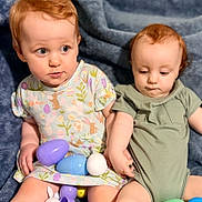 Dale joined the competition — help win amazing prizes! baby, toddler, child, red_hair, easter_eggs, plastic_eggs, dress, onesie, blue_blanket, indoor, sitting, cute, playing, toy, two_children, person, face, happy, curious, soft_lighting
