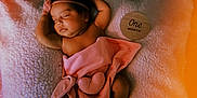 Kasiah joined the competition — help win amazing prizes! baby, sleeping, pink, headband, blanket, soft_texture, heart_shaped_plush, newborn, infant, one_month, cute, peaceful, portrait, indoors, cozy, warm_lighting, wrapped, lying_down, child, resting