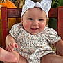 baby, child, headband, bow, smiling, laughing, chair, pumpkin, autumn, orange, greenery, clothing, cute, happy, portrait, sitting, furniture, indoor, skin, face