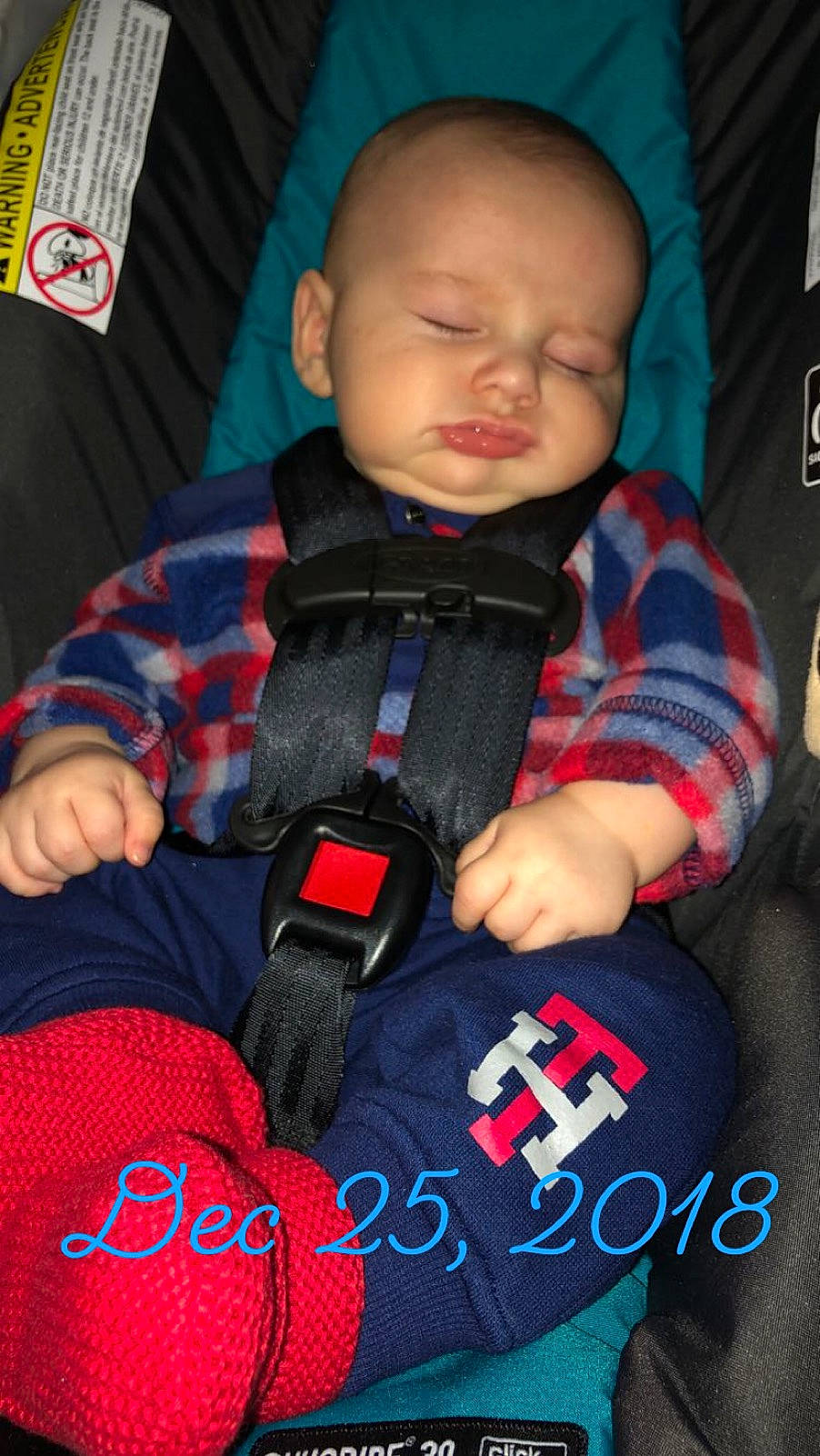 Dante is registered to the contest to win money with this photo: baby_carriage, baby_products, blue, boy, car_seat, child, cool, day, fun, infant, person, play, product, red, sitting, toddler