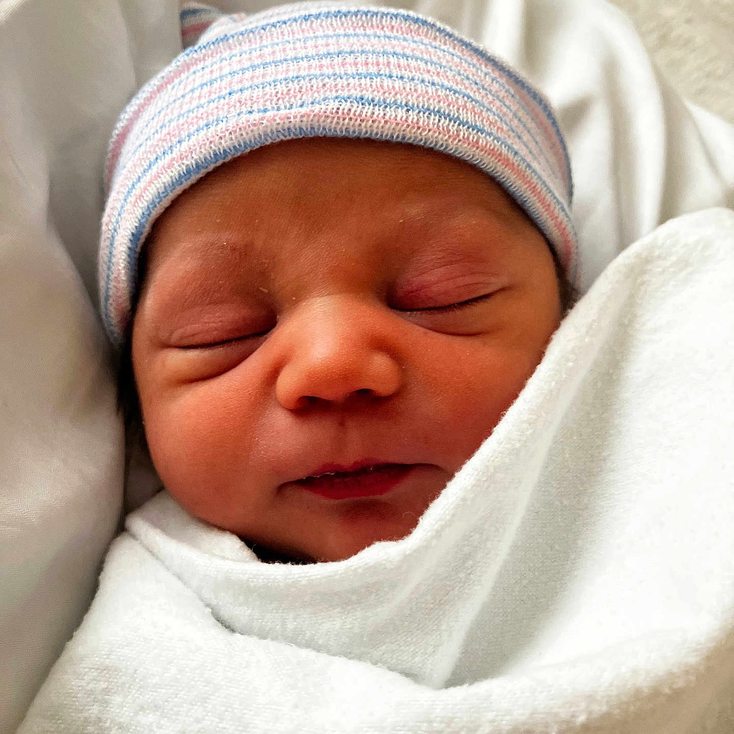 Luii is registered to the contest to win money with this photo: architecture, baby, bed, blanket, building, cap, clothing, face, furniture, glove, hat, head, hospital, newborn, person, photography, portrait, quilt, sleeping, towel