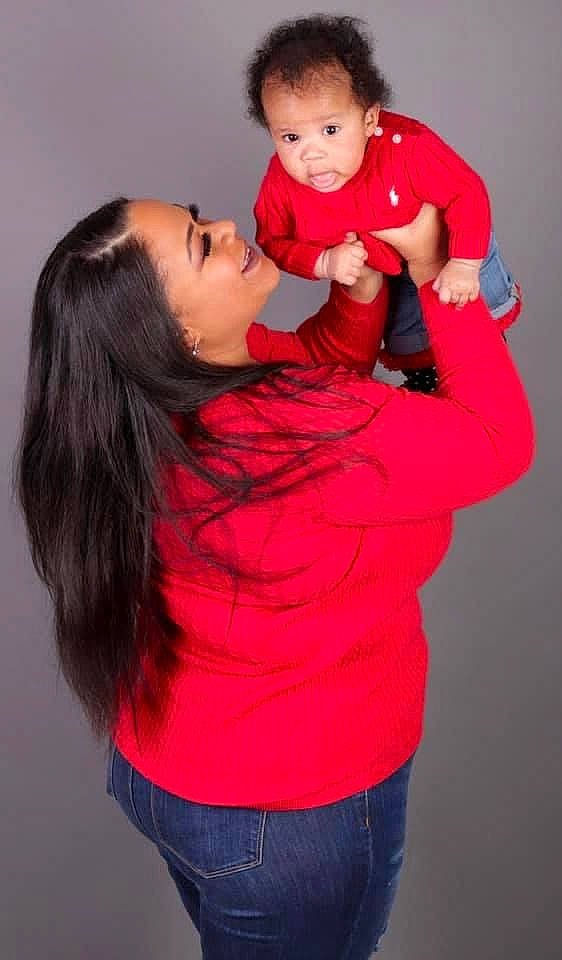 Arizona joined the competition — help win amazing prizes! baby, cheek, denim, elbow, eye, hairstyle, head, interaction, jeans, joint, joy, lip, love, neck, organ, person, red, shoulder, sleeve, standing