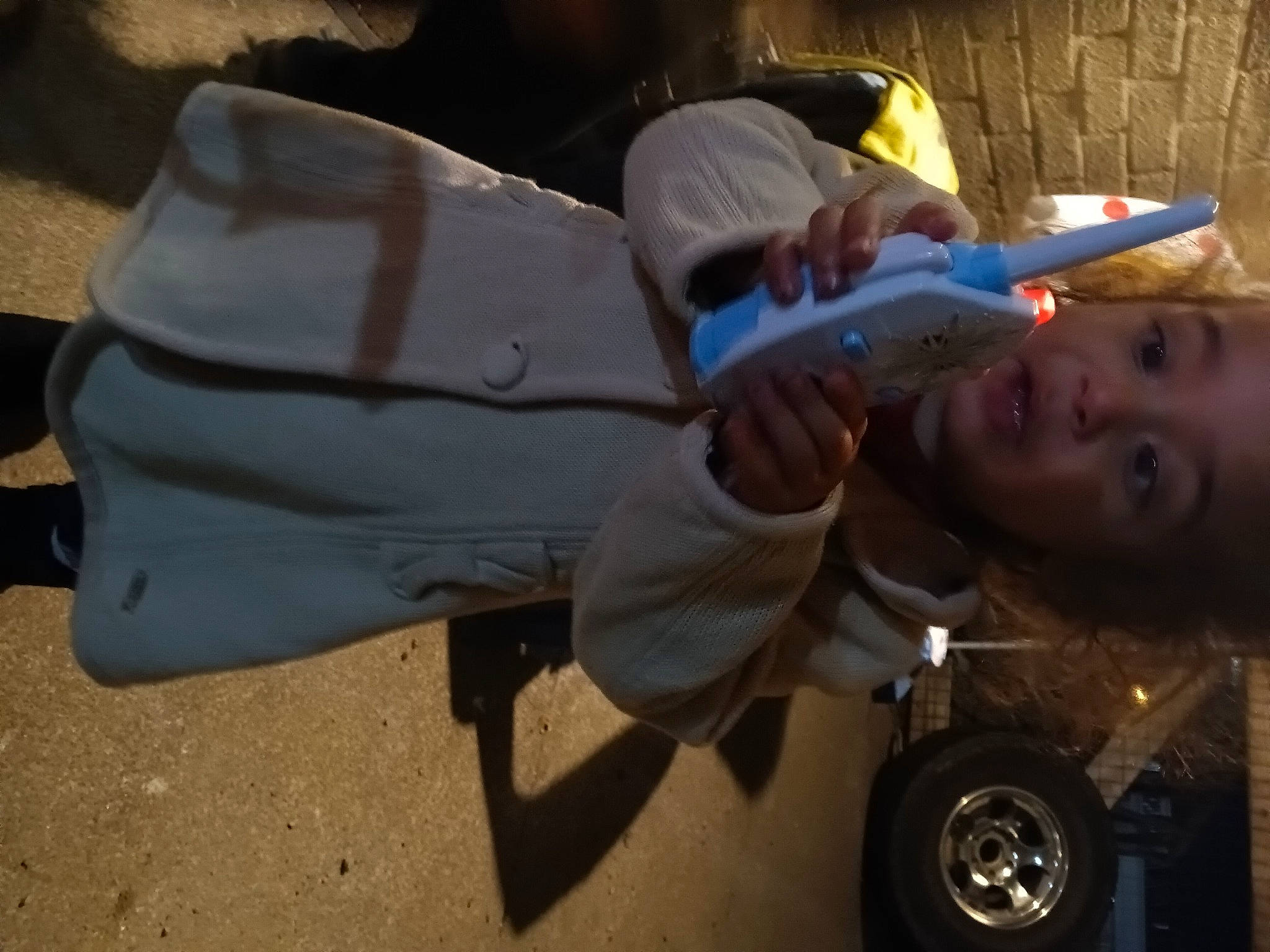 Alayhna is registered to the contest to win money with this photo: child, fun, landscape, person, recreation, sitting, soil, surprise, tire, toddler, travel, tree, wheel