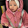baby, child, infant, pink_jacket, headband, bow, car_seat, seatbelt, polka_dot_pants, cute, wide_eyes, clothing, bundle, warm, indoor, person, adorable, soft_texture, button, straps