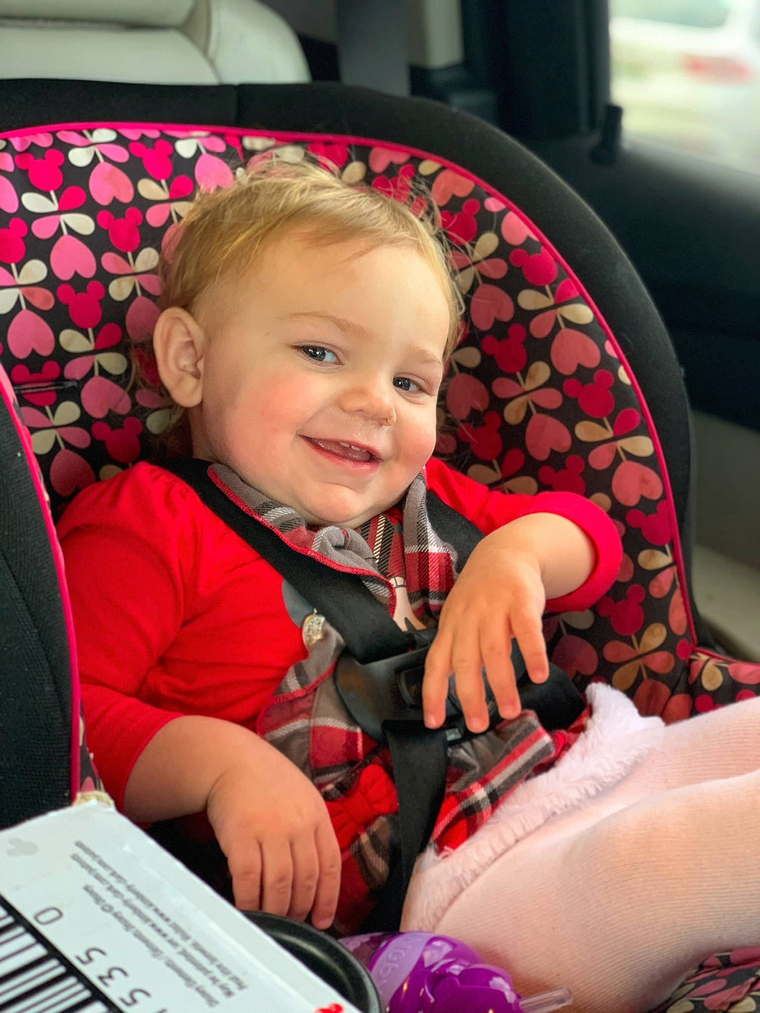 Everleigh is registered to the contest to win money with this photo: automotive_design, baby, baby_carriage, car_seat, car_seat_cover, comfort, eye, facial_expression, hairstyle, head, human_body, joy, leg, mammal, motor_vehicle, person, pink, product, skin, smile