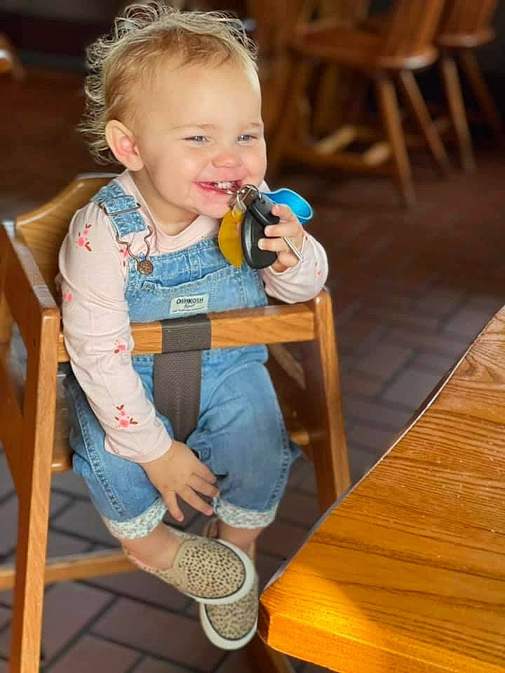 Everleigh joined the competition — help win amazing prizes! baby, baby_toddler_clothing, chair, child, event, face, furniture, happy, human_body, jeans, joy, leg, leisure, person, recreation, sitting, smile, sneakers, sock, table