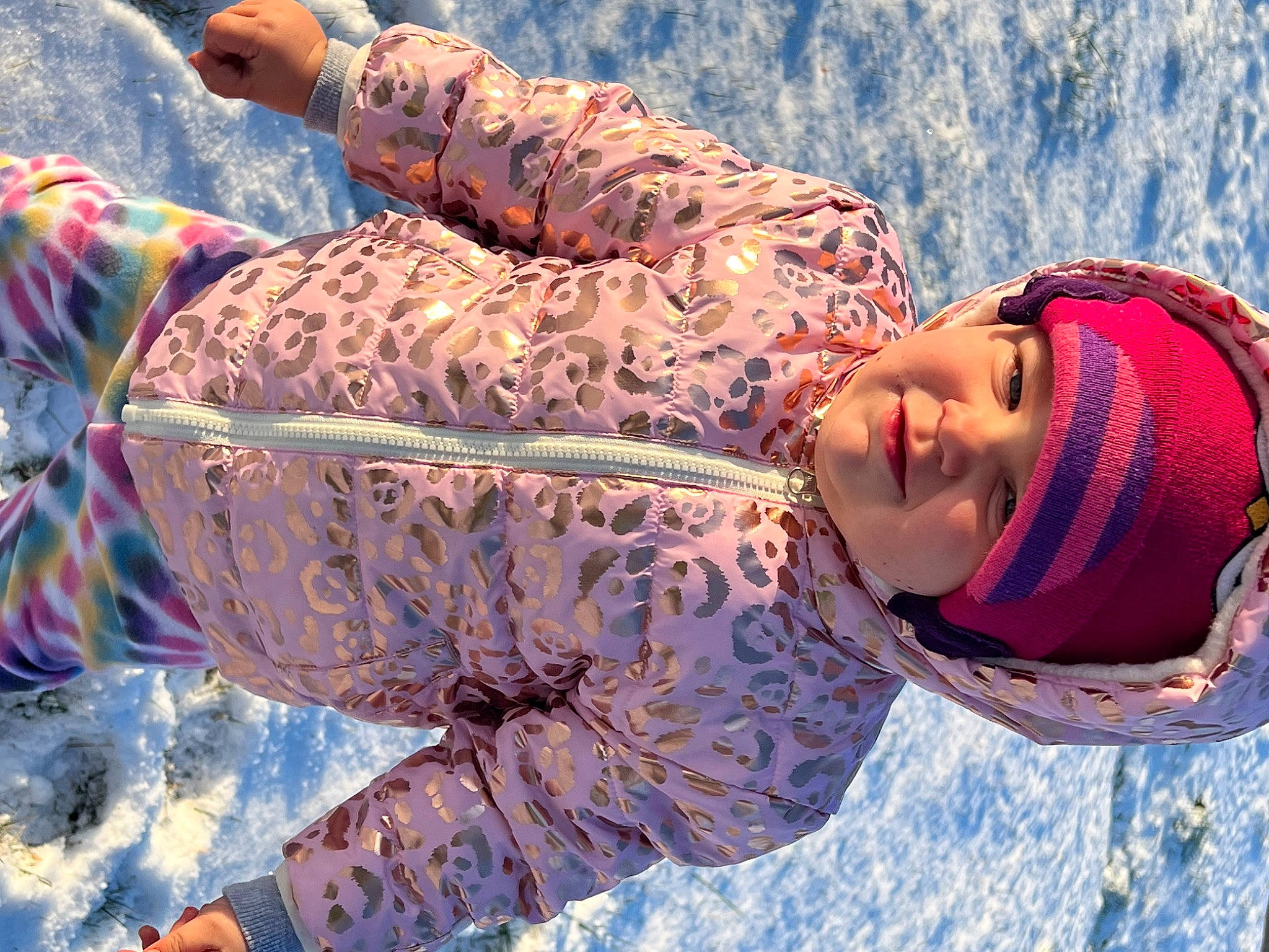 Everleigh is registered to the contest to win money with this photo: adaptation, beauty, body_of_water, child, cool, facial_expression, freezing, fun, geological_phenomenon, happy, headgear, headwear, landscape, leisure, people_in_nature, person, recreation, snow, textile, travel