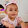 Felizia Rae joined the competition — help win amazing prizes! toddler, child, baby, headband, pink, smile, indoor, toy_car, hands, face, cute, eyes, clothing, playing, happy, young_child, person, infant, portrait, home