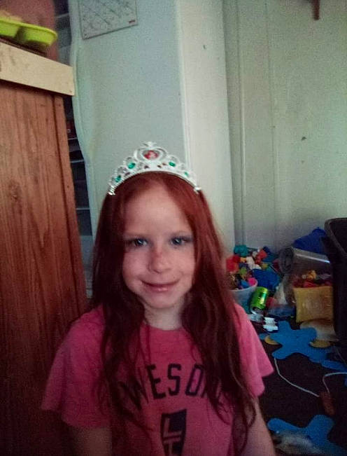 Miyah is registered to the contest to win money with this photo: blond, brown_hair, cap, clothing, cool, costume_hat, event, eyebrow, fun, happy, headband, headpiece, human_body, iris, joy, long_hair, neck, party_hat, party_supply, person