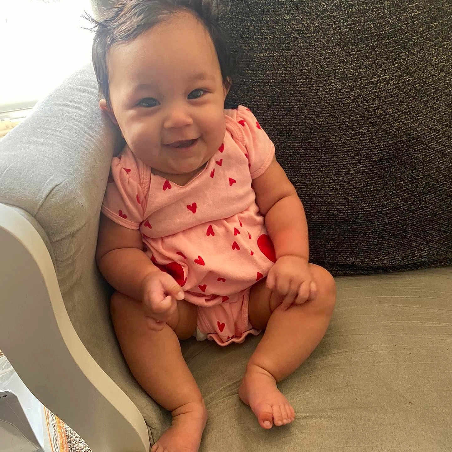 Chandler joined the competition — help win amazing prizes! baby, babylaughing, chair, clothing, couch, cushion, face, furniture, happy, head, homedecor, laughing, pants, person, photography, pillow, portrait, sitting, sleeve, smile