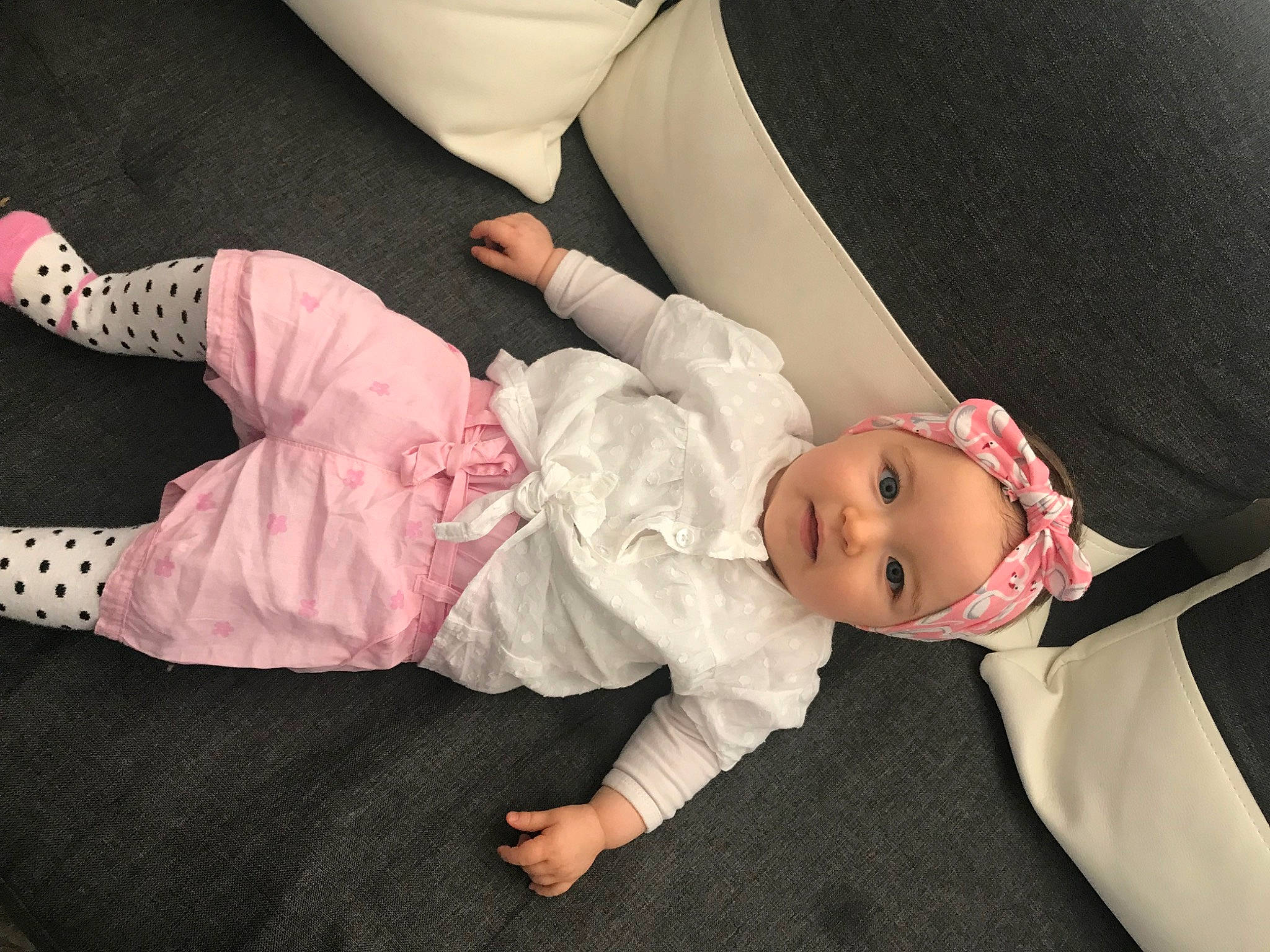 Celyanna a rejoint le concours — aidez-le/la à gagner de superbes lots ! arm, baby, baby_toddler_clothing, child, comfort, finger, hat, headgear, headwear, human_body, human_leg, knee, leg, outerwear, person, skin, sleeve, smile, sock, thigh