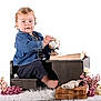 Alessio a rejoint le concours — aidez-le/la à gagner de superbes lots ! toddler, child, barefoot, denim_jacket, small_globe, wooden_chair, wooden_desk, open_book, old_books, flowers, plush_toy, white_rug, indoor, portrait, curious, baby, sitting, cozy, vintage_style, cute