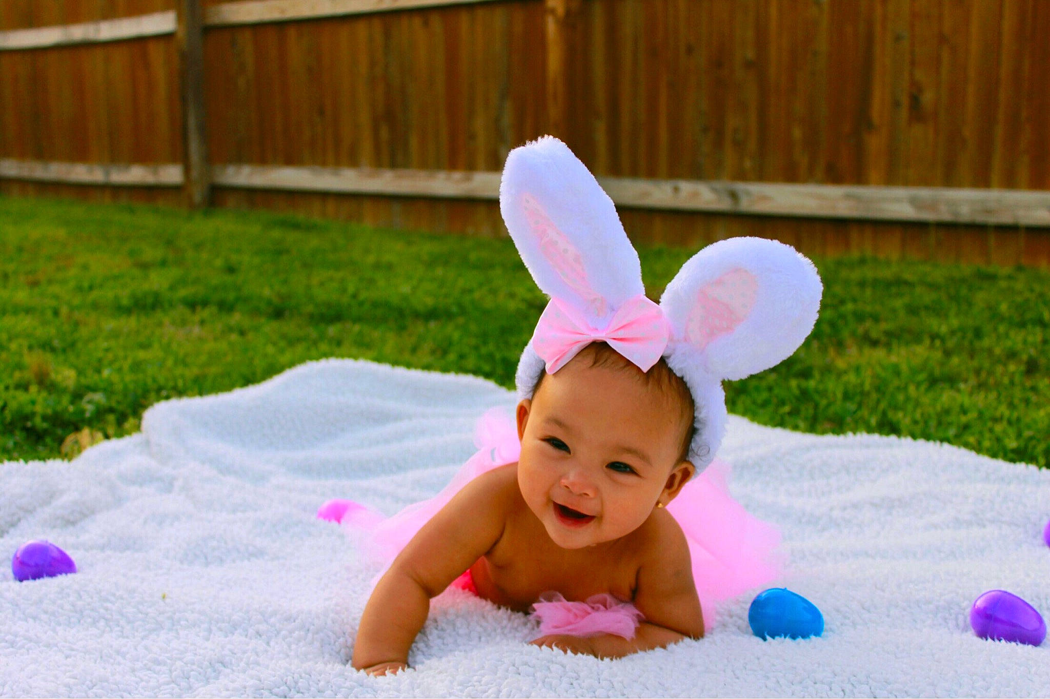 Moon joined the competition — help win amazing prizes! baby, baby_toddler_clothing, child, costume, ear, easter_bunny, fun, grass, happy, headgear, person, pink, play, toddler, tummy_time