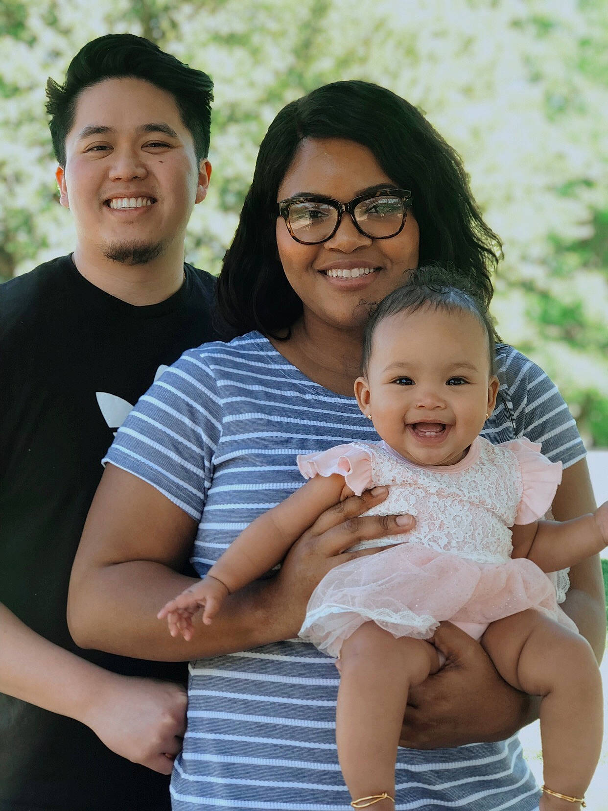 Moon is registered to the contest to win money with this photo: abdomen, baby, child, daughter, family, family_pictures, family_taking_photos_together, father, glasses, grass, happy, joy, mother, people, person, photo_shoot, photography, sitting, smile, toddler