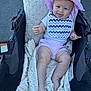 Brixlee is registered to the contest to win money with this photo: baby, stroller, blanket, hat, bib, smiling, child, outdoor, person, clothing, pink, white, texture, fabric, footwear, cute, infant, legs, happy, sunhat
