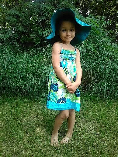 Queen joined the competition — help win amazing prizes! child, clothing, dress, fashion_accessory, grass, green, headgear, joy, pattern, person, plant, play, smile, summer, sun_hat, toddler, turquoise, vacation