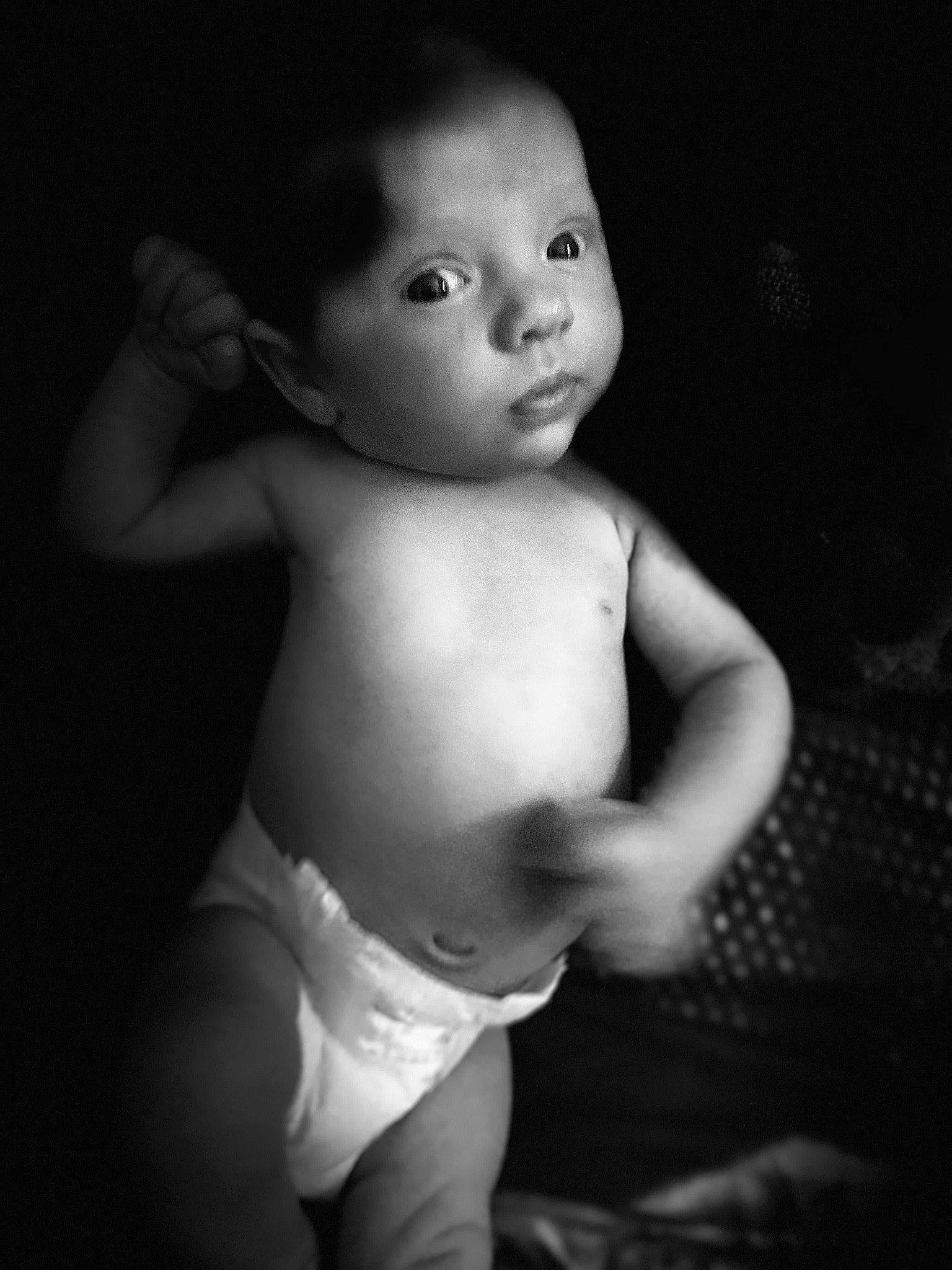 Blaise is registered to the contest to win money with this photo: arm, baby, black, black_and_white, cheek, child, eye, hand, leg, lip, monochrome, monochrome_photography, muscle, person, photograph, photography, skin, smile, standing, toddler