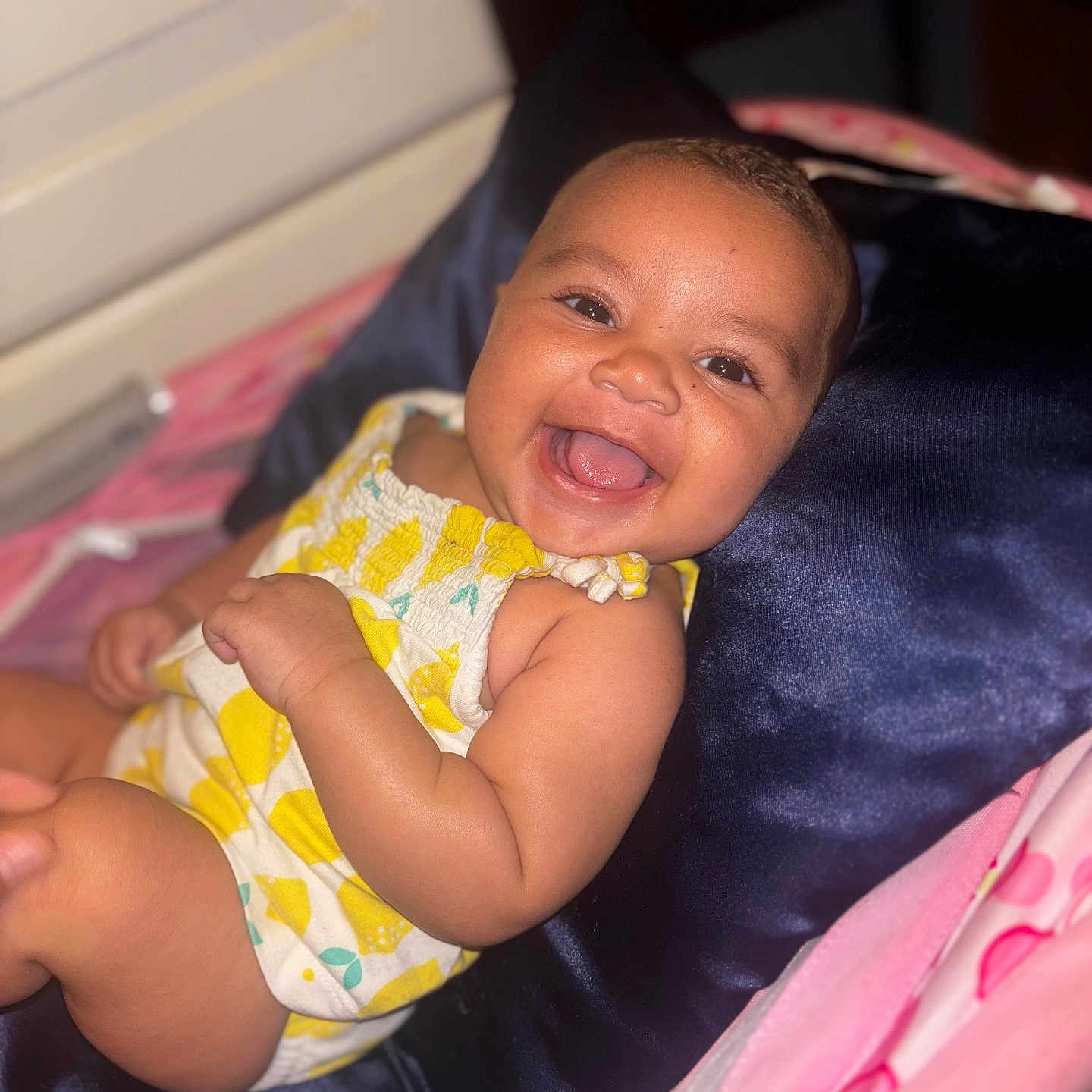 Jaycie is registered to the contest to win money with this photo: baby, babylaughing, bed, bodypart, clothing, cushion, diaper, dress, face, furniture, happy, head, homedecor, laughing, mouth, person, photography, portrait, smile, teeth