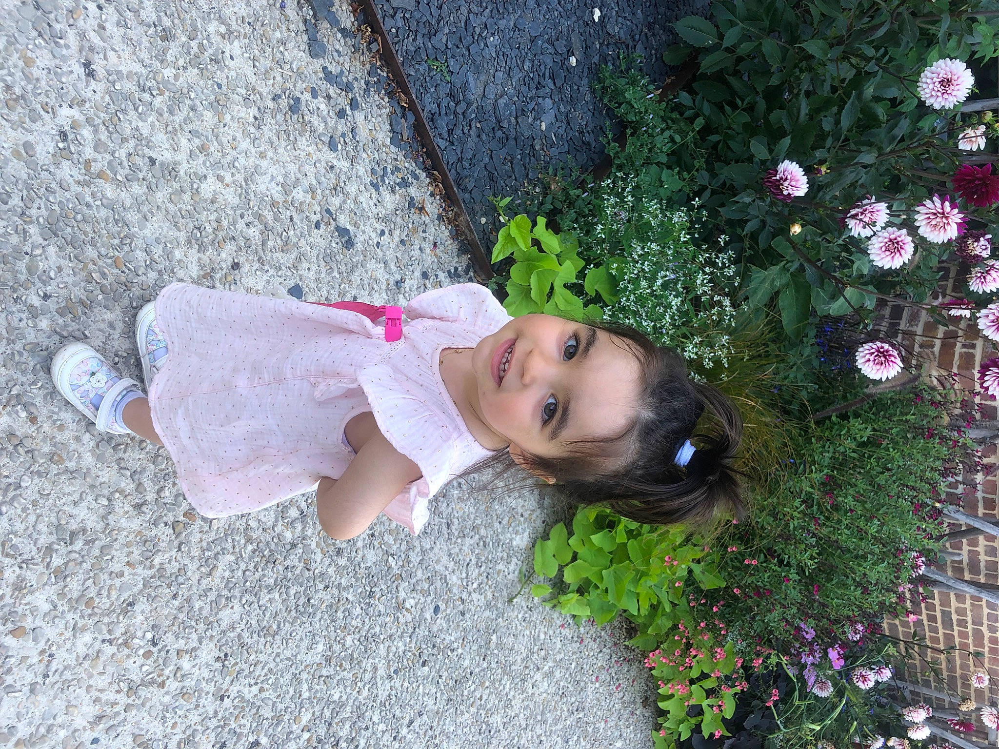 Célestine a rejoint le concours — aidez-le/la à gagner de superbes lots ! annual_plant, child, flower, flower_arranging, flowering_plant, garden, grass, groundcover, happy, joy, magenta, people_in_nature, person, petal, pink, plant, road_surface, rose, rose_family, shrub