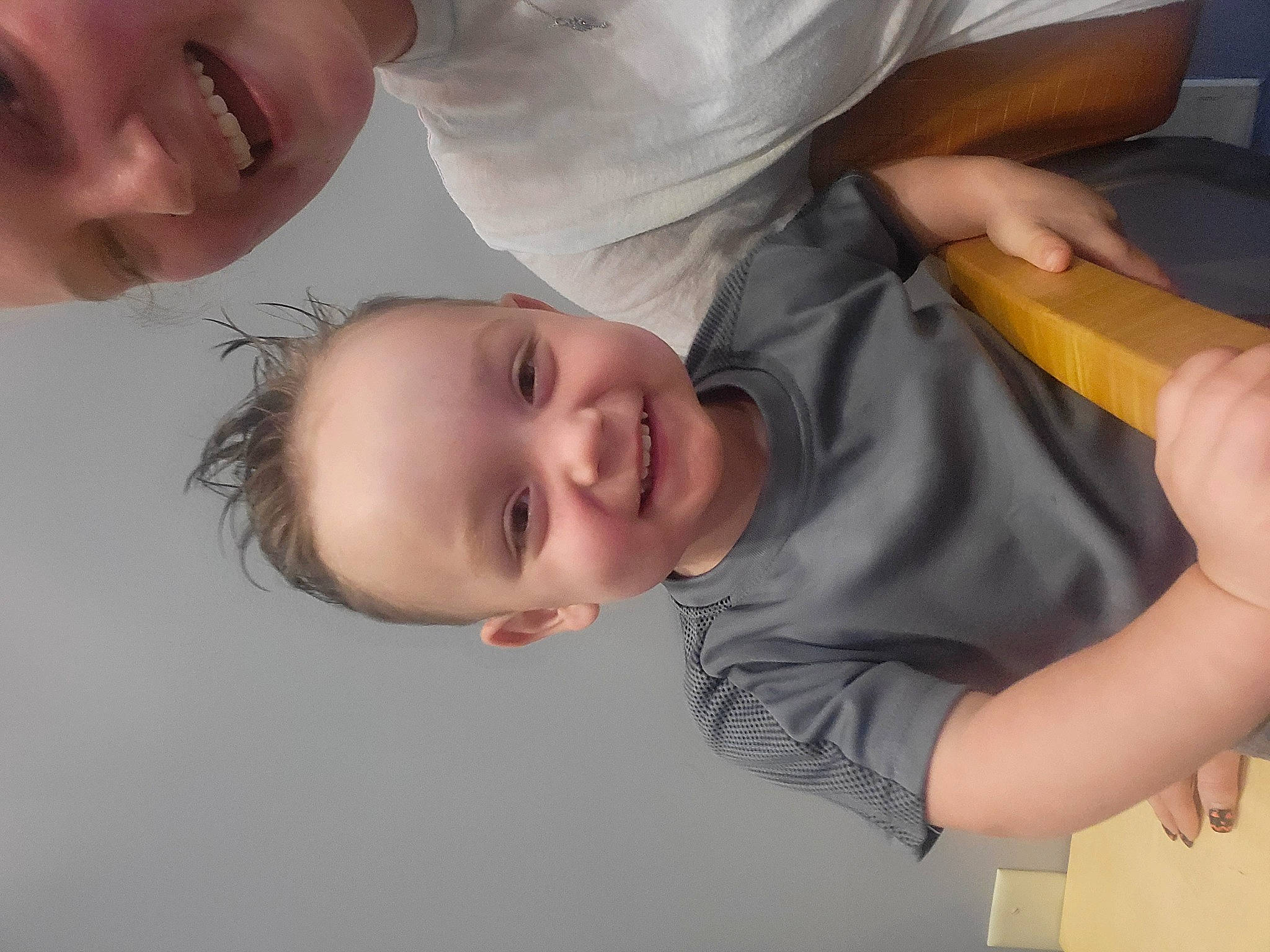 Joshua is registered to the contest to win money with this photo: cheek, chest, child, elbow, eyelash, finger, fun, gesture, happy, joint, joy, lip, mouth, neck, nose, person, shoulder, sleeve, smile, thumb