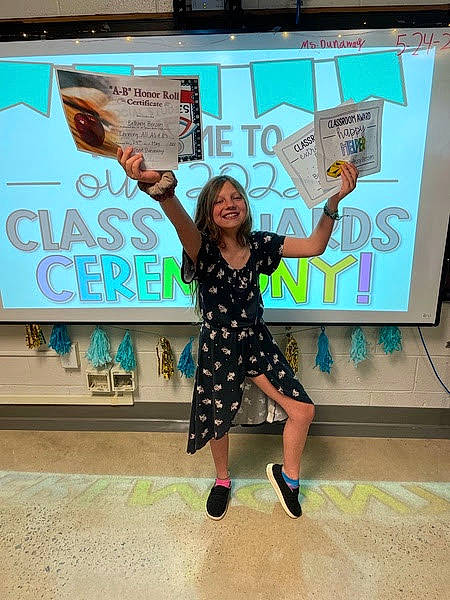 Bethany joined the competition — help win amazing prizes! advertising, child, competition, display_device, dress, entertainment, event, fashion_design, flooring, fun, gesture, happy, joy, leisure, pattern, performing_arts, person, recreation, room, sandal