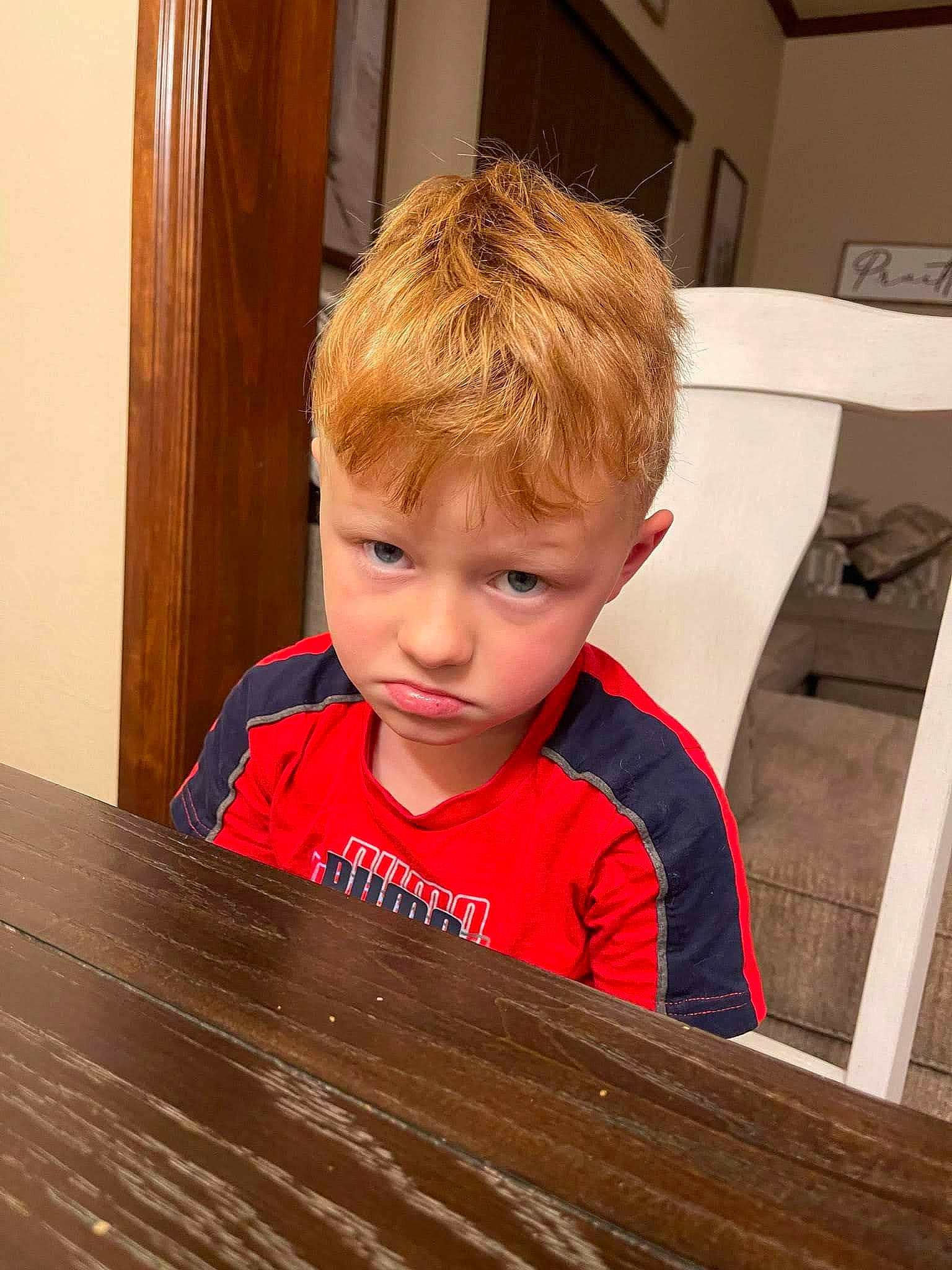 Rylyn joined the competition — help win amazing prizes! blond, child, chin, curious, floor, flooring, fun, hardwood, head, leisure, person, plank, rectangle, room, sitting, t_shirt, table, toddler, varnish, wood