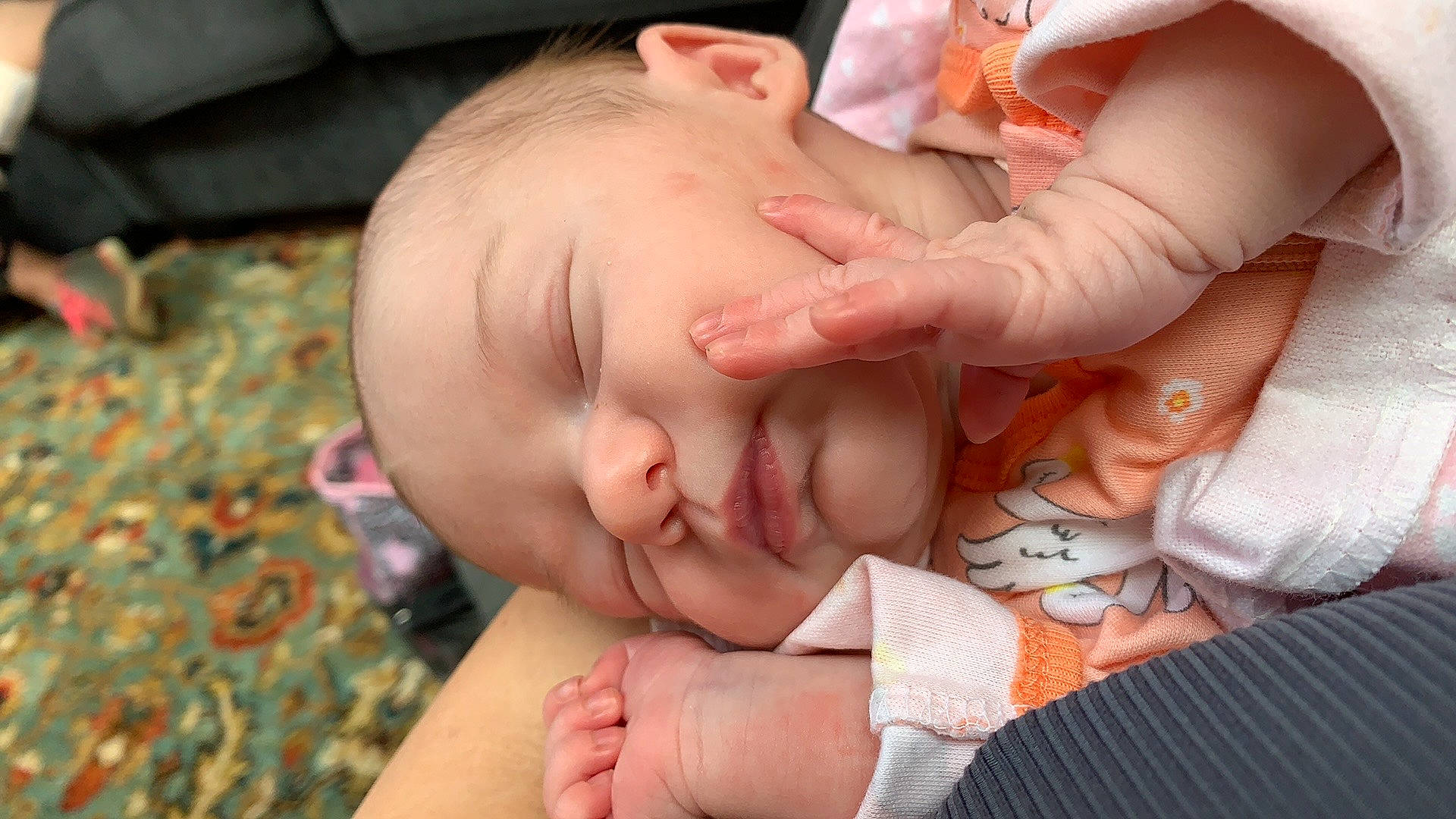Ellie is registered to the contest to win money with this photo: baby, birth, cheek, child, childbirth, finger, gesture, hand, mouth, nose, person, skin, sleep, thumb