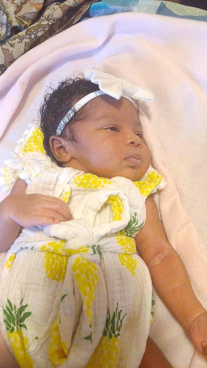 Morgan joined the competition — help win amazing prizes! baby, baby_products, baby_toddler_clothing, cheek, child, comfort, dress, event, eye, facial_expression, fun, grass, hair_accessory, happy, human_body, linens, person, skin, textile, toddler