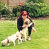 woman, red_hair, dog, dogs, grass, garden, plants, greenery, outdoor, pet, animal, crouching, hugging, playing, yard, nature, summer, casual, happy, interaction