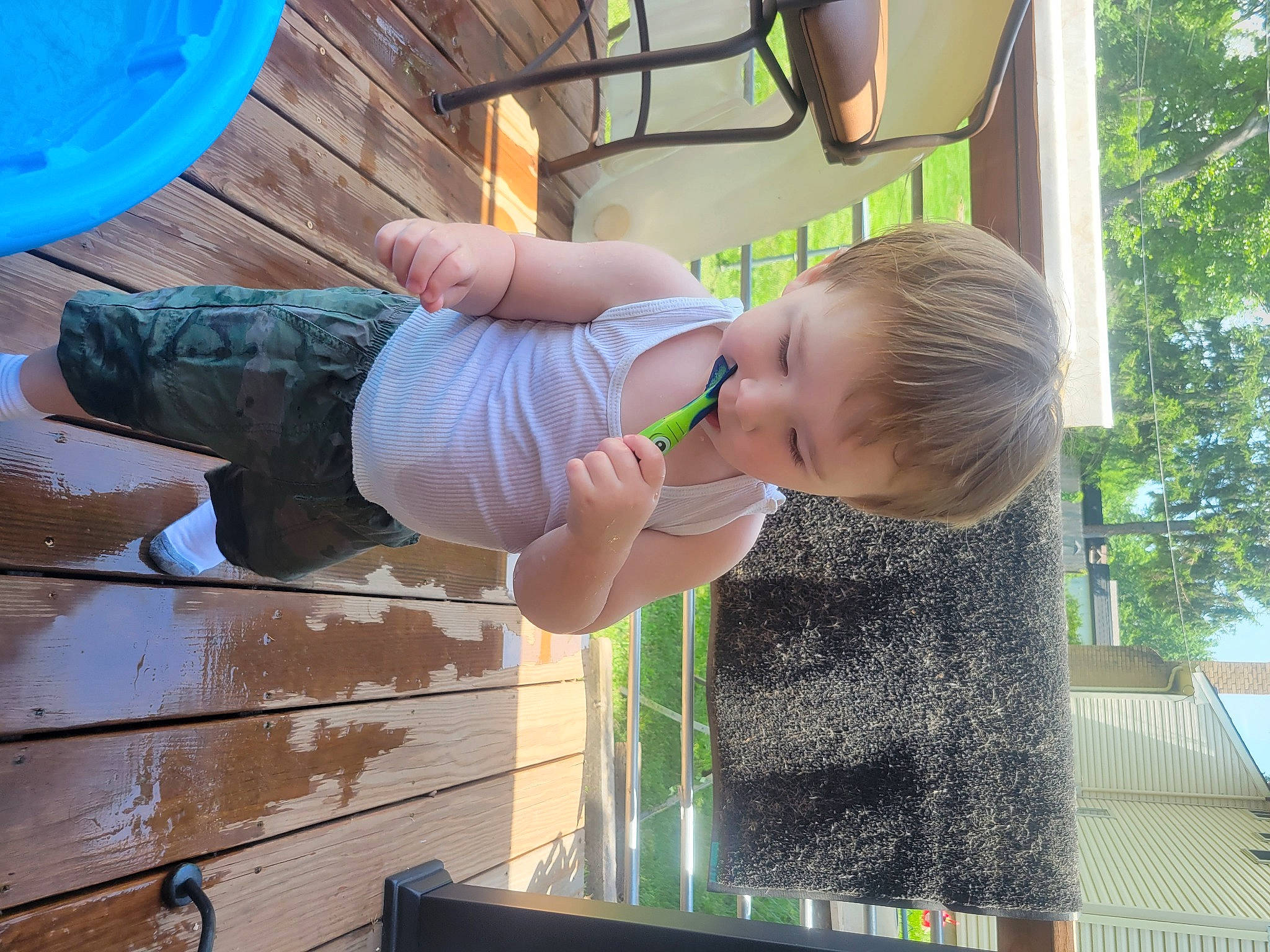 Grayson is registered to the contest to win money with this photo: baby, baby_products, baby_toddler_clothing, balloon, blue, child, fun, grass, green, happy, head, human_body, human_leg, leisure, person, play, sitting, toddler, tree, vacation