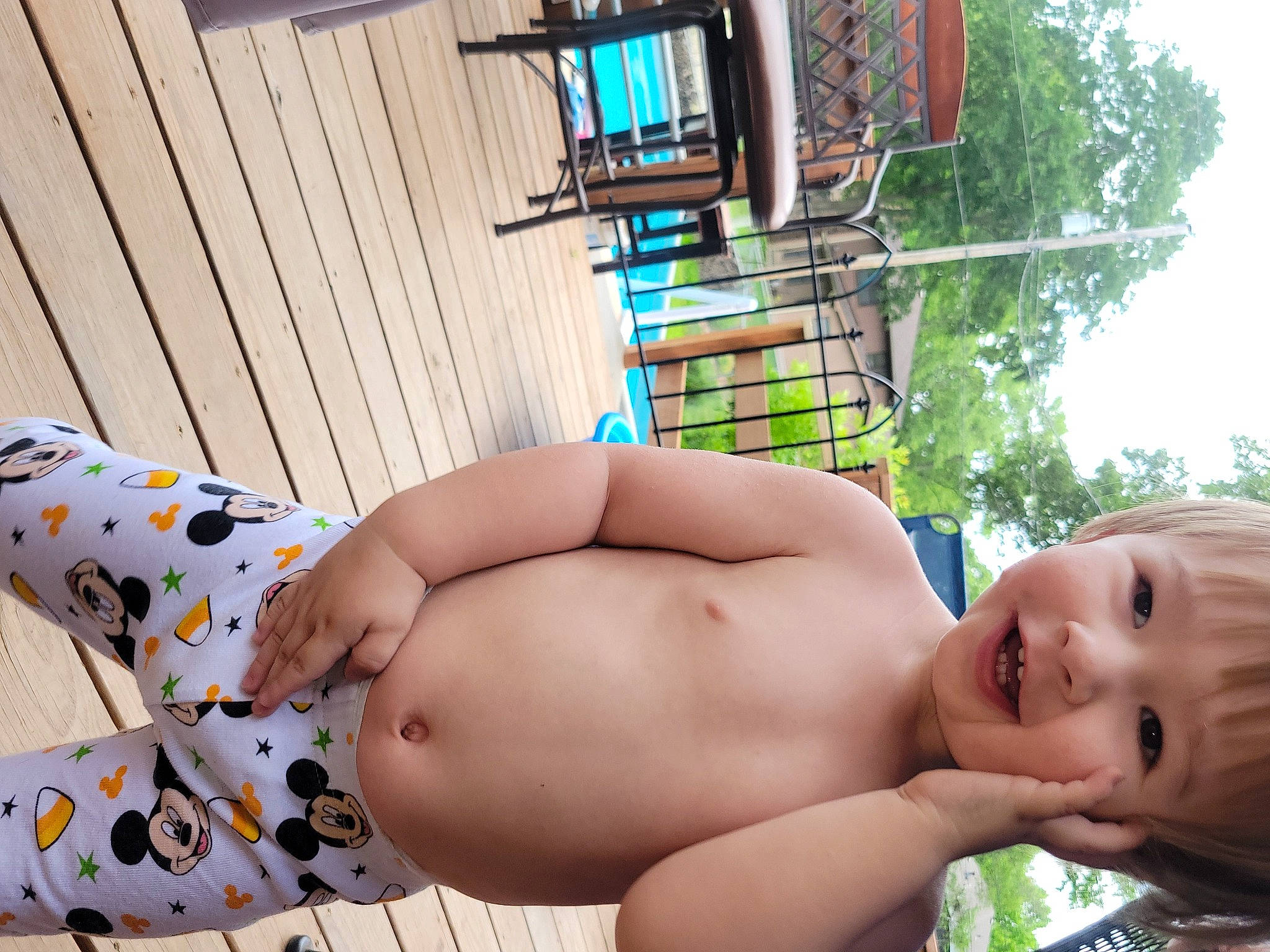 Grayson joined the competition — help win amazing prizes! beauty, child, finger, grass, human_body, human_leg, joy, leg, leisure, muscle, people_in_nature, person, plant, smile, swimsuit_bottom, swimwear, thigh, toddler, tree, trunk