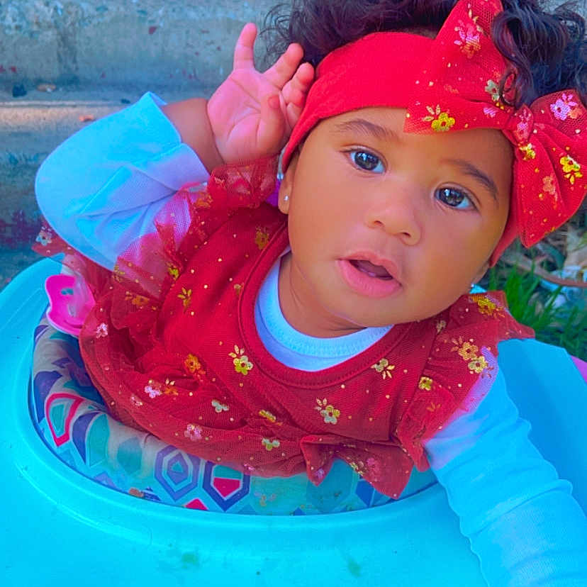 Jahnay is registered to the contest to win money with this photo: accessories, baby, bodypart, child, clothing, face, female, finger, footwear, girl, hand, happy, hat, head, outdoors, person, photography, playarea, portrait, shoe