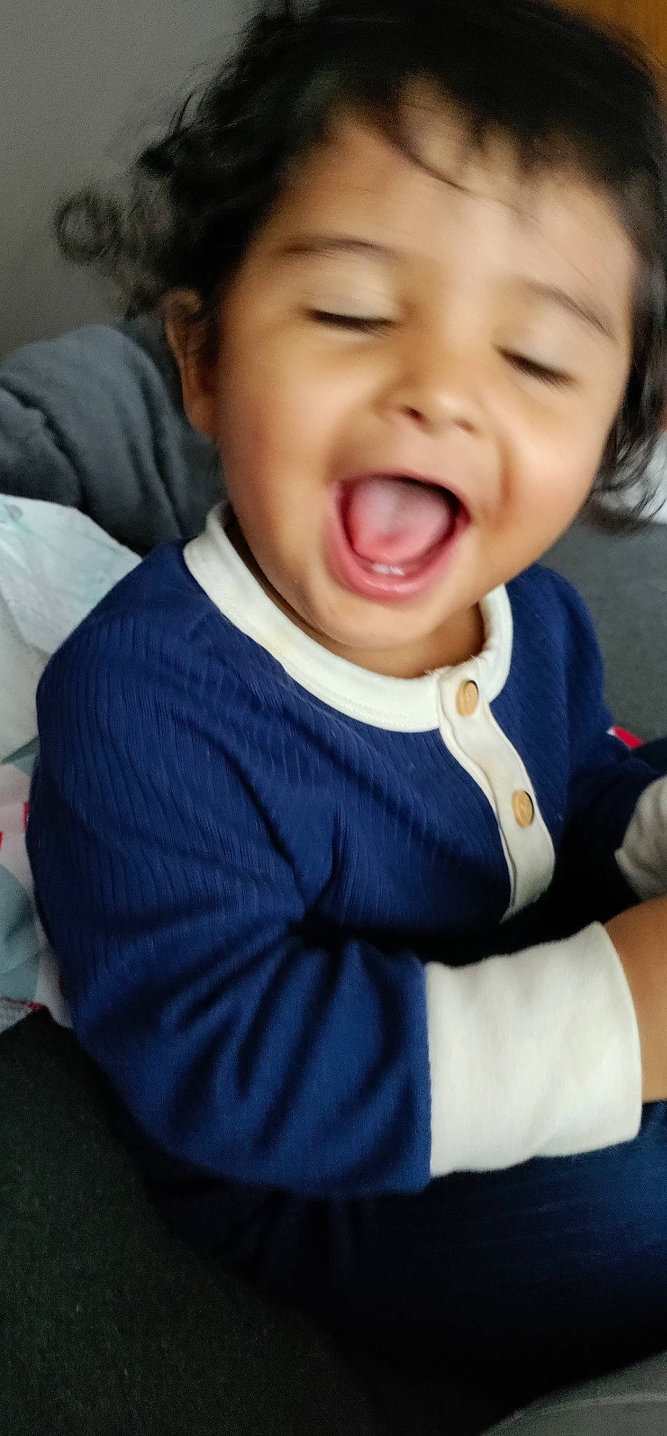 Adrien is registered to the contest to win money with this photo: baby_toddler_clothing, cheek, chin, comfort, ear, eyebrow, face, finger, gesture, happy, iris, jaw, lip, mouth, neck, nose, person, skin, sleeve, smile