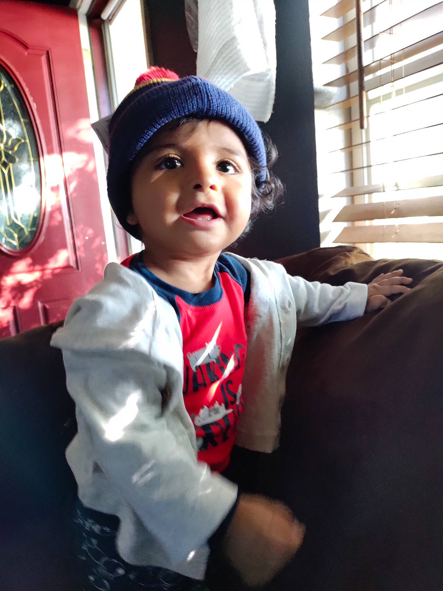 Adrien joined the competition — help win amazing prizes! automotive_lighting, automotive_tire, automotive_wheel_system, baby, baby_toddler_clothing, cap, child, curtain, fun, happy, hat, headwear, motor_vehicle, person, room, sitting, skin, smile, toddler, vehicle_door