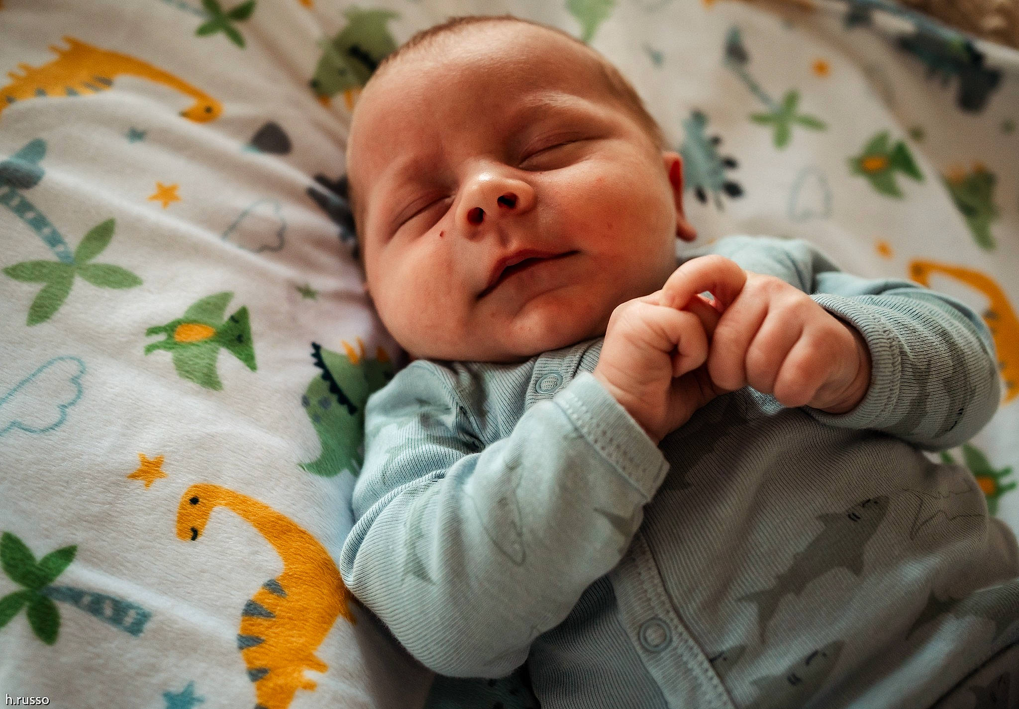 Gabe joined the competition — help win amazing prizes! baby, baby_products, baby_sleeping, baby_toddler_clothing, cheek, child, comfort, face, finger, grass, happy, head, linens, nose, pattern, person, skin, sleeve, textile, thumb
