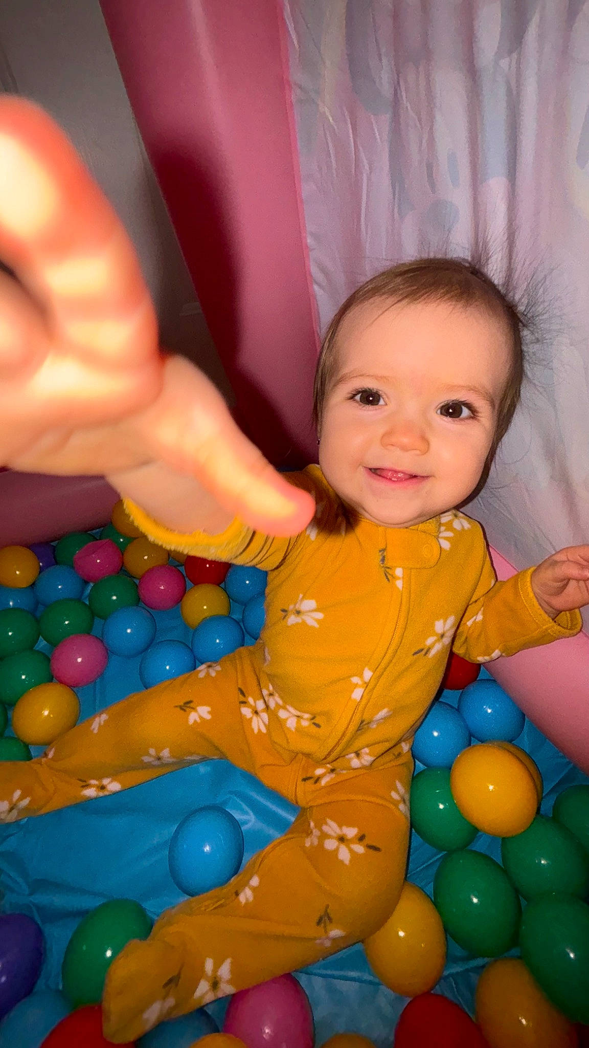Aubrey joined the competition — help win amazing prizes! arm, baby_playing_with_toys, ball, ball_pit, child, eye, face, finger, fun, happy, head, human_body, joy, leisure, person, pink, red, smile, textile, toddler