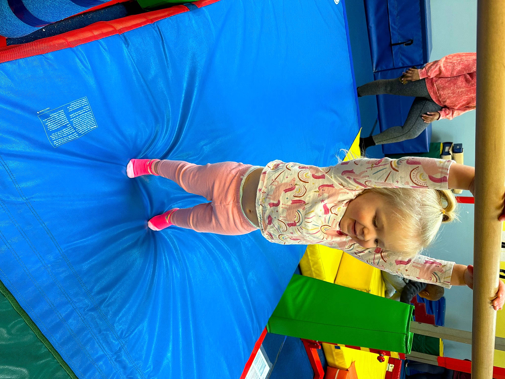 Aviana is registered to the contest to win money with this photo: art, blue, bounce_house, child, electric_blue, event, fun, leisure, magenta, person, play, public_event, recreation, red, tarpaulin, textile, toddler, visual_arts, water, world