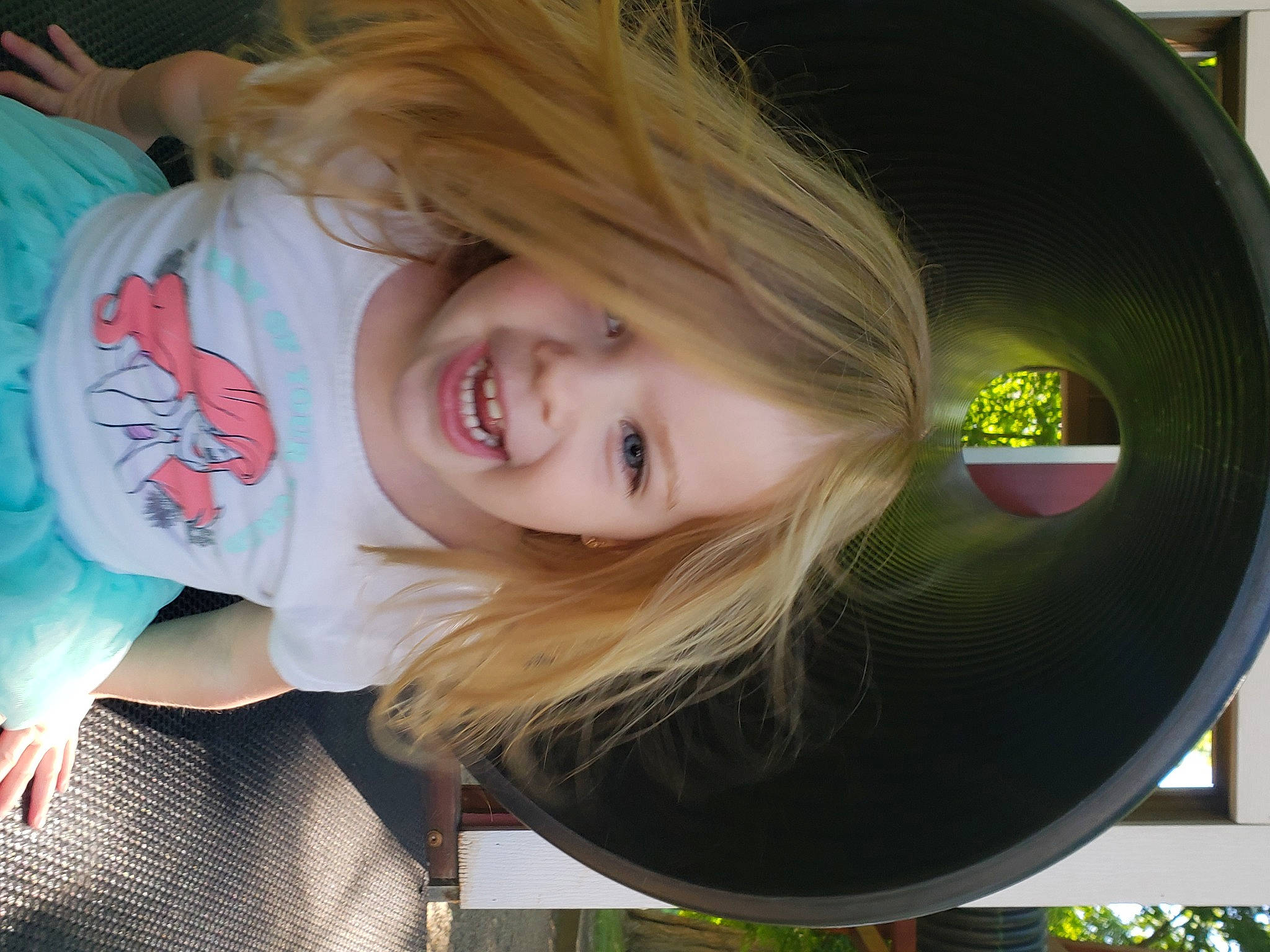 Emerson is registered to the contest to win money with this photo: bangs, blond, brown_hair, child, chin, eyelash, facial_expression, fun, grass, hair, hairstyle, happy, iris, joy, layered_hair, lip, long_hair, nose, person, skin