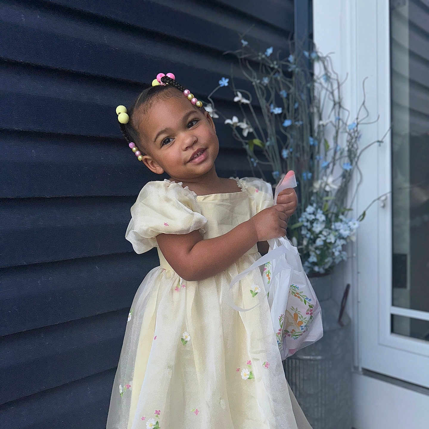 Zakaylah joined the competition — help win amazing prizes! child, clothing, door, dress, face, female, flower, formalwear, girl, head, jar, person, petal, photography, plant, planter, portrait, pottedplant, pottery, vase