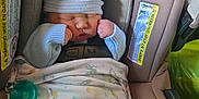 Spencer joined the competition — help win amazing prizes! baby, newborn, car_seat, blanket, hat, sleeping, infant, child, clothing, pacifier, evenflo, safety, cute, cozy, indoor, portrait, resting, wrapped, small, peaceful