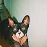 Simone participe au concours pour gagner de l'argent avec cette photo : cat, sphynx_cat, hairless, pet, animal, portrait, indoors, hallway, carpet, wall, green_eyes, large_ears, wrinkled_skin, sitting, lying_down, staring, close_up, flash_photography, black_and_white, domestic_animal