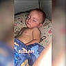 Greyson is registered to the contest to win money with this photo: baby, sleeping, blanket, pillow, child, indoors, nap, early_morning, face, peaceful, cozy, bedtime, cute, soft_lighting, head, young_child, resting, portrait, comfort, toddler
