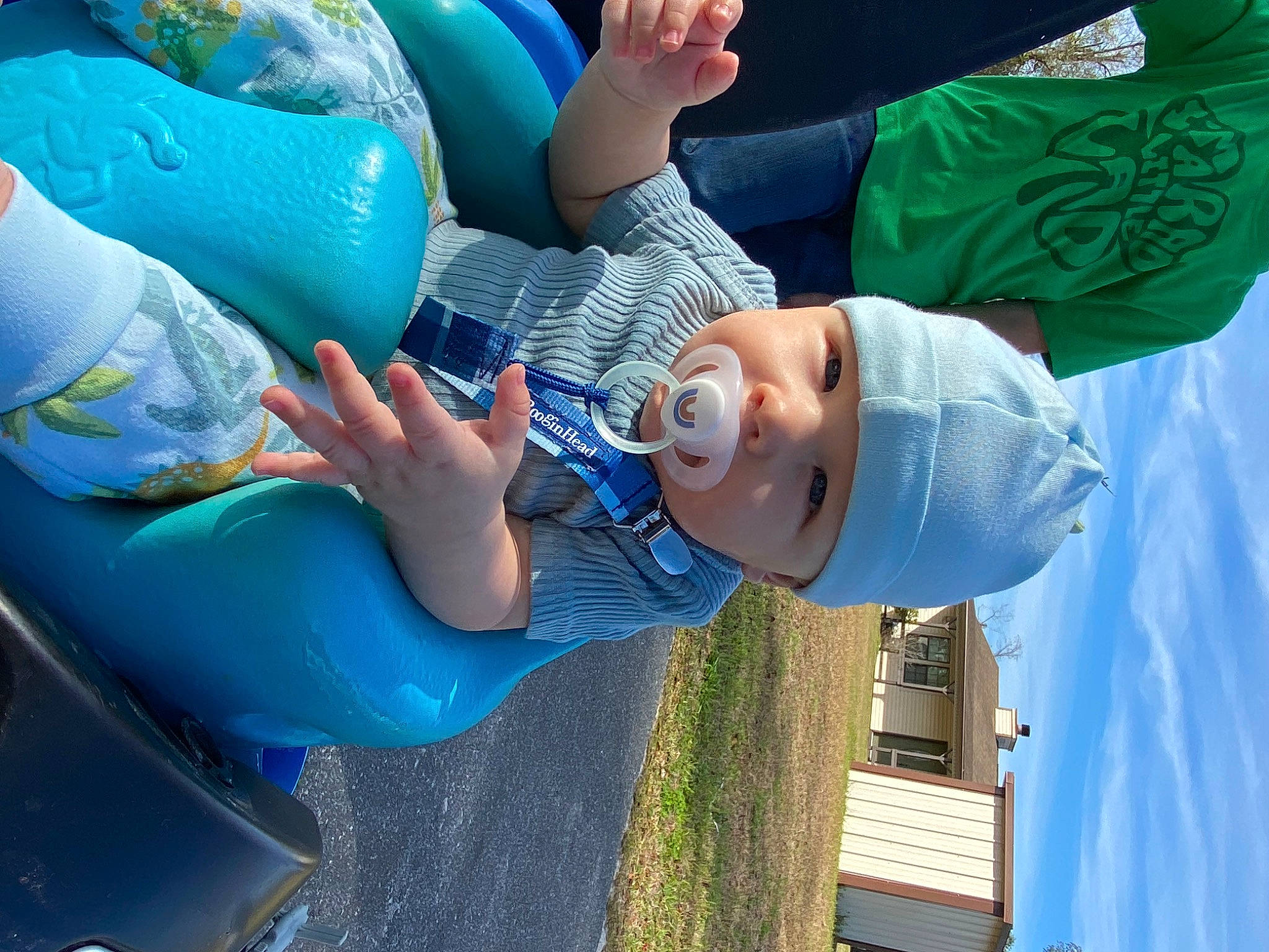 Jackson is registered to the contest to win money with this photo: arm, azure, baseball_cap, blue, child, elbow, electric_blue, event, fun, gesture, green, hand, happy, hat, headwear, leisure, person, recreation, smile, sunglasses
