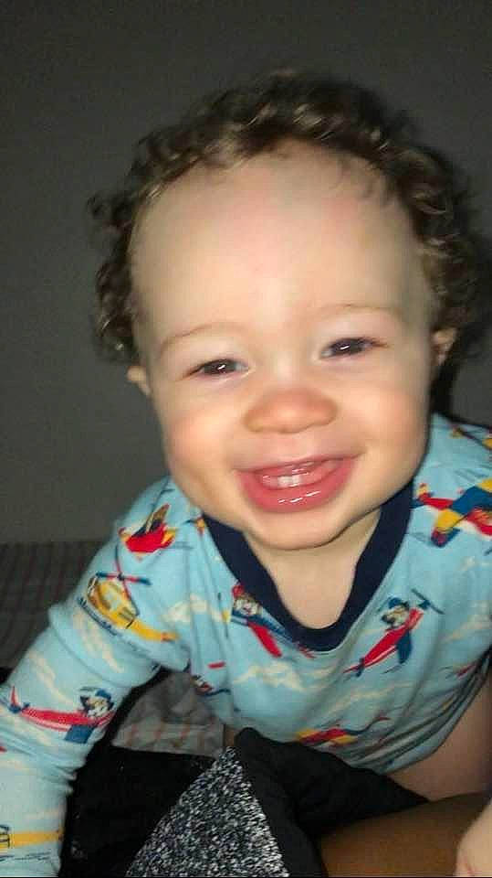 Kingston is registered to the contest to win money with this photo: arm, baby_toddler_clothing, cheek, ear, eyebrow, eyelash, flash_photography, forehead, happy, human_body, iris, joy, lip, mouth, neck, nose, person, skin, sleeve, smile