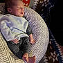 Apollo is registered to the contest to win money with this photo: baby, sleeping, newborn, blanket, cushion, patterned, clothing, foot, hand, face, indoors, resting, cozy, child, person, peaceful, cute, soft, comfort, portrait