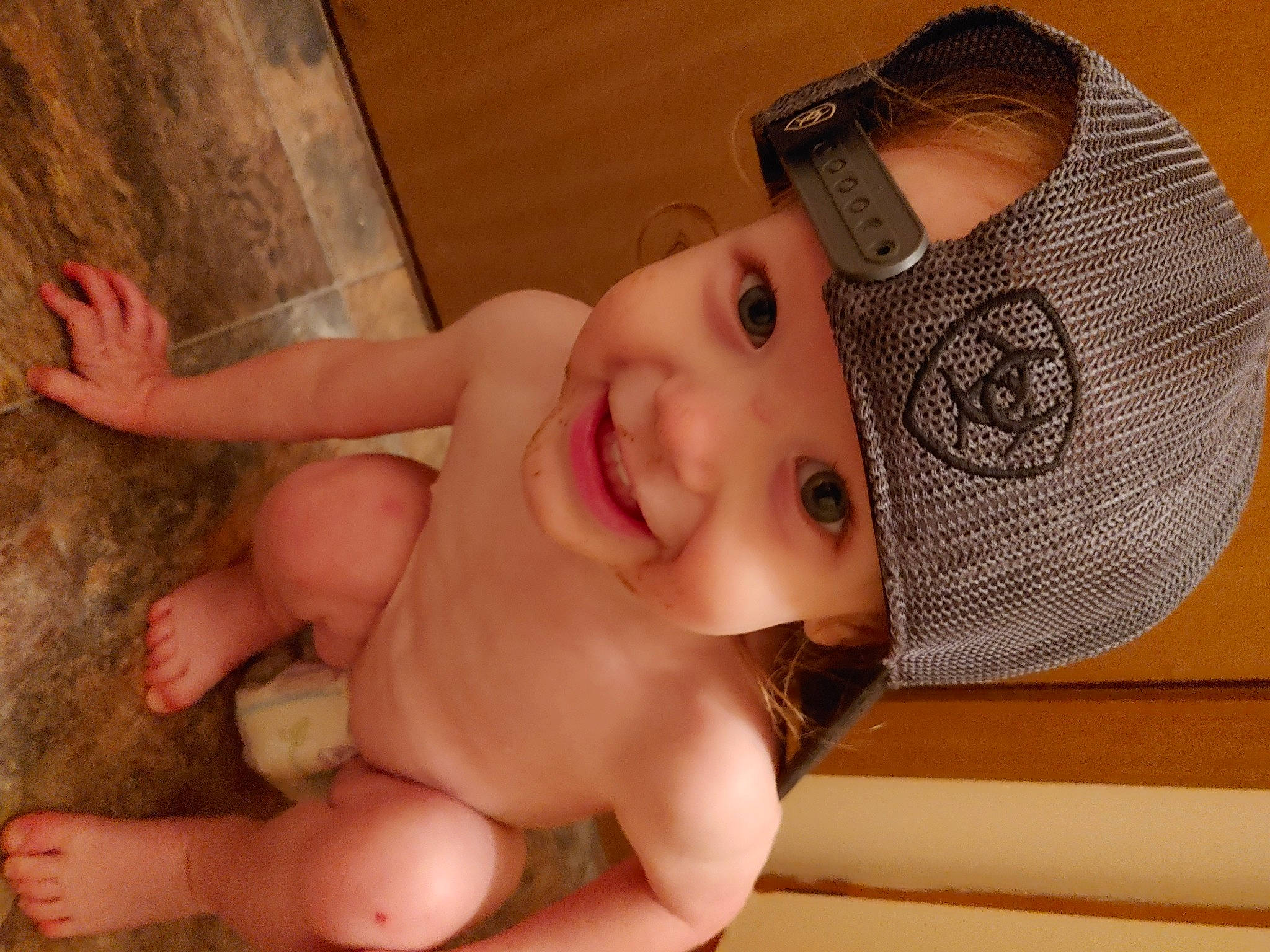 Lennox is registered to the contest to win money with this photo: baby, cap, cheek, child, headgear, headwear, joy, person, skin, toddler
