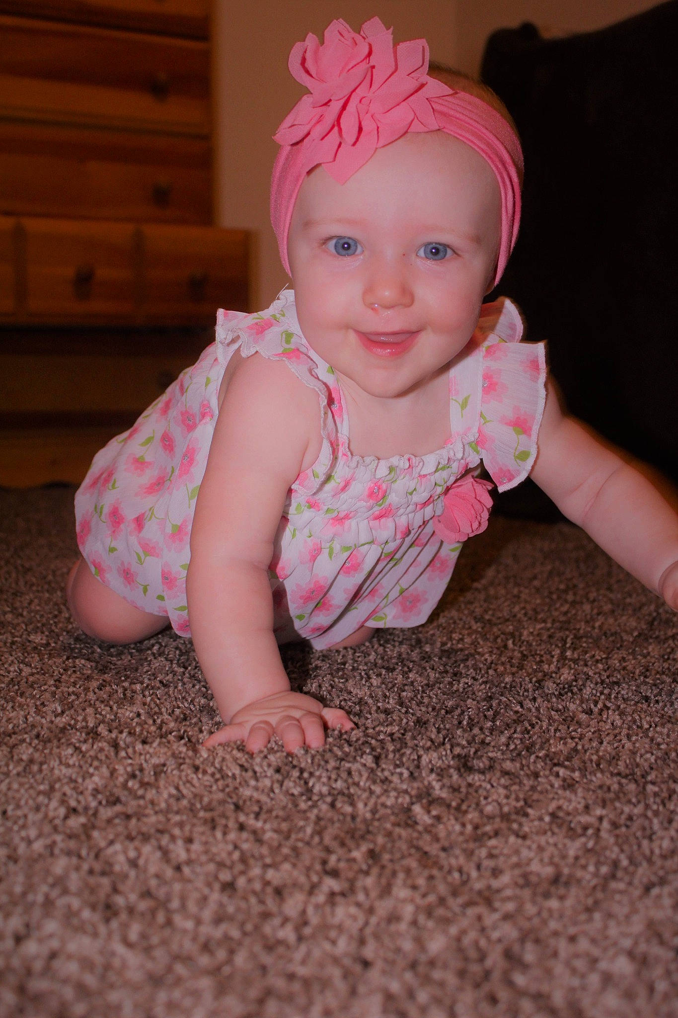 Emerald is registered to the contest to win money with this photo: baby, baby_toddler_clothing, cheek, child, crawling, hair_accessory, headgear, headwear, joy, person, pink, skin, smile, toddler