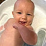 Jace is registered to the contest to win money with this photo: baby, bath, water, tub, smile, dimples, skin, infant, cute, happy, child, playful, wet, closeup, face, arm, mouth, expression, young, indoors