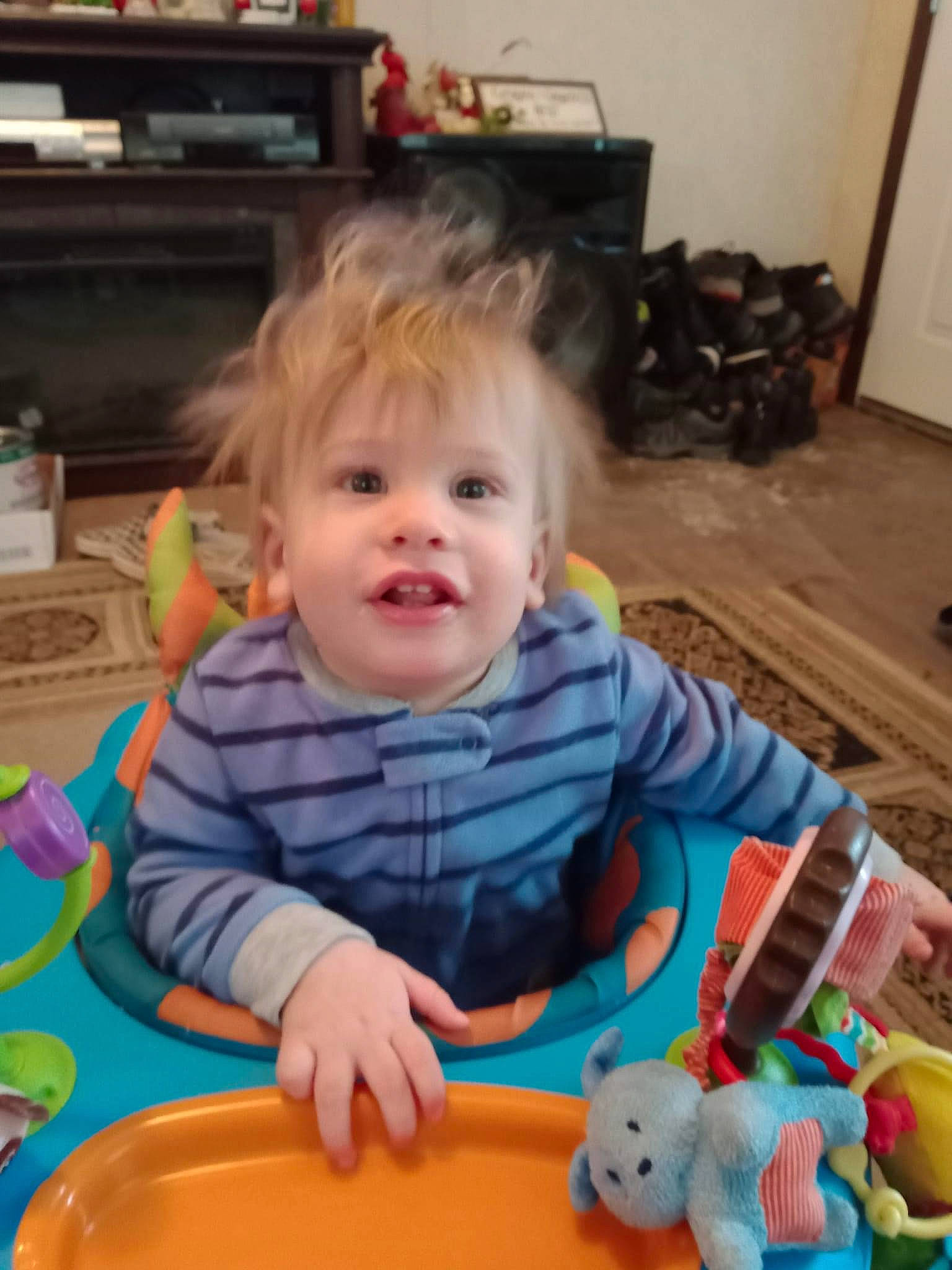 Landen is registered to the contest to win money with this photo: baby, baby_playing_with_toys, baby_toddler_clothing, baby_toys, child, computer_keyboard, flooring, fun, happy, leisure, mammal, organ, person, play, room, sitting, smile, t_shirt, toddler, toy