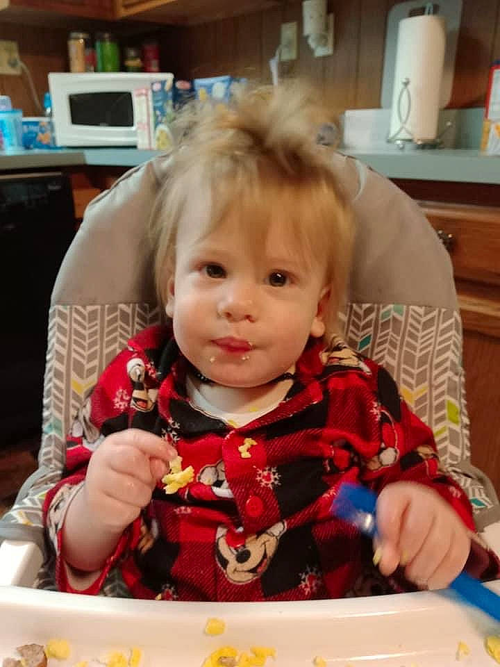 Landen is registered to the contest to win money with this photo: baby, baby_toddler_clothing, baking, chair, cheek, child, comfort_food, eating, event, face, fun, holiday, home_appliance, icing, kitchen_appliance, party, person, sitting, sweetness, television